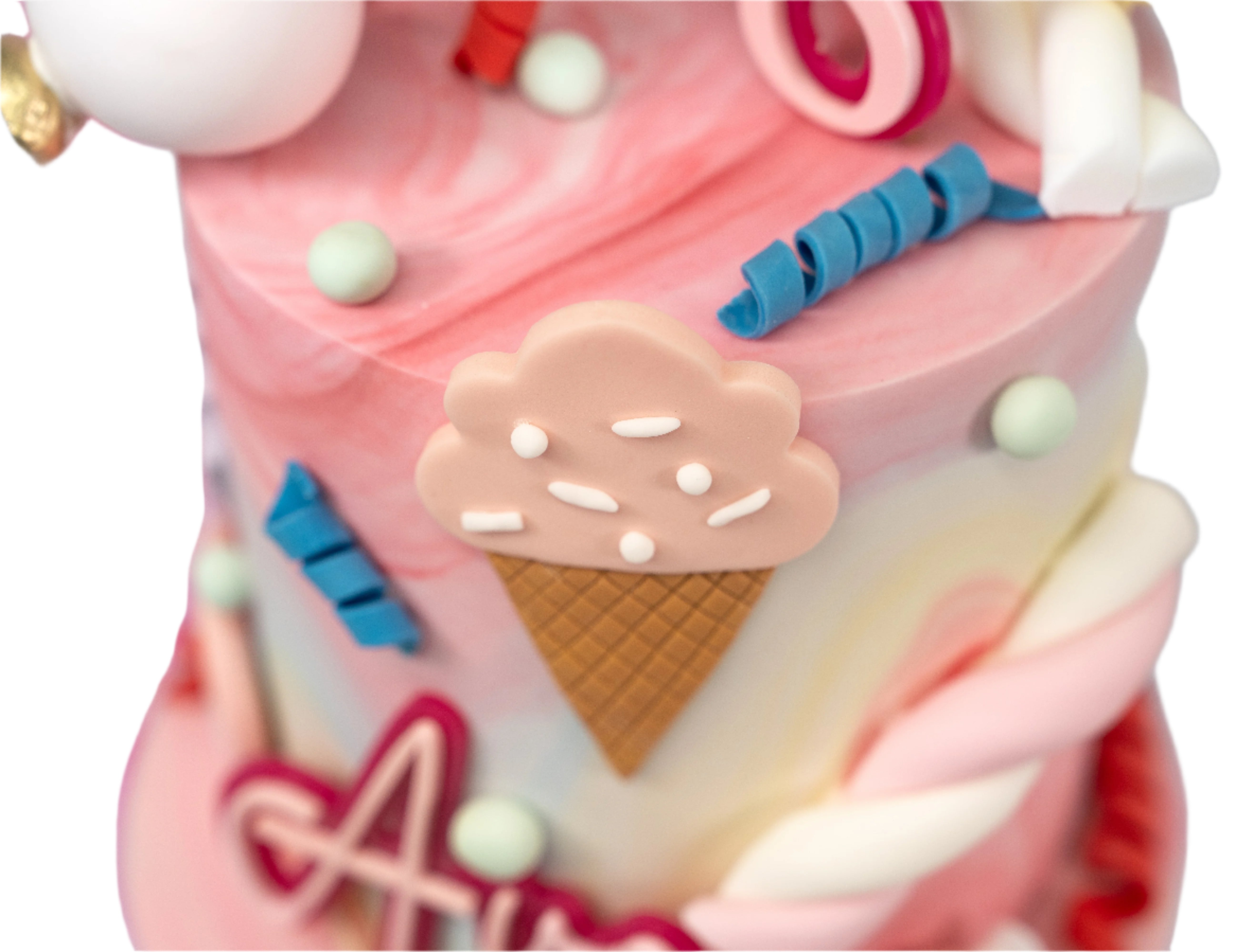 A whimsical Candyland-themed cake with pastel swirls, edible ice cream cones, lollipops, candy twists, and a personalised name plaque and age topper — the perfect centrepiece for any celebration.