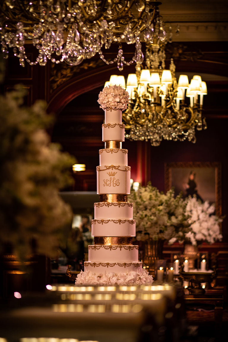 luxury tall wedding cake in a grand hotel in paris