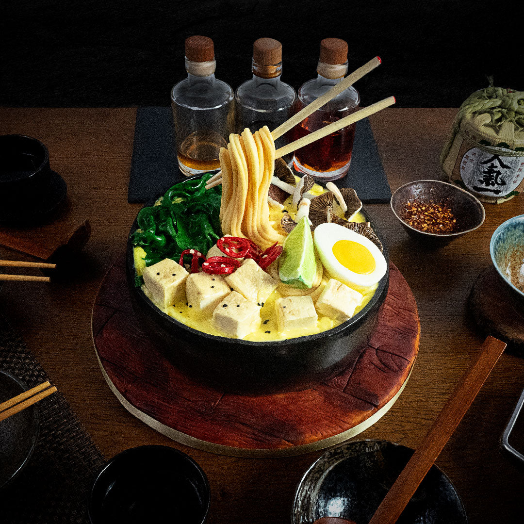 Delicious Ramen cake consisting of mushrooms, eggs, noddles & tofu - all made out of a flavourful light & moist sponge cake. This hyper-realistic cake makes for a lovely dinner dessert! Keep the chopsticks as a souvenir!
