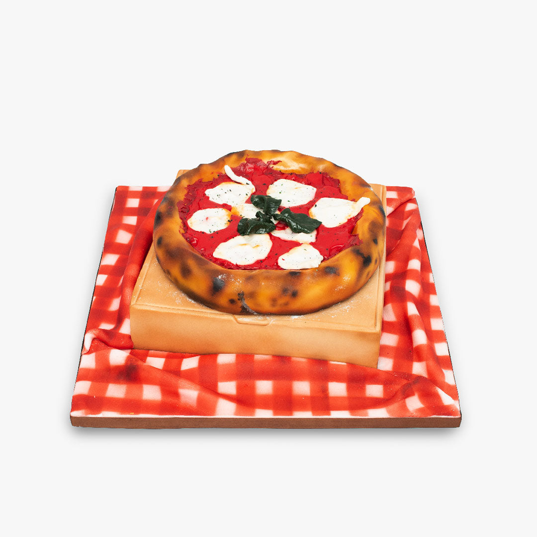 A pizza cake no other. Delicious golden crust with edible cheese and mozzarella toppings, even the pizza box is cake
