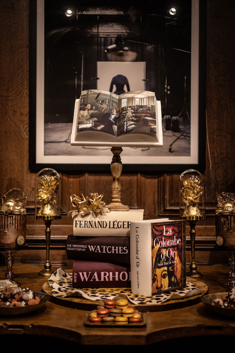 books made out of cake on display at a luxury event in london
