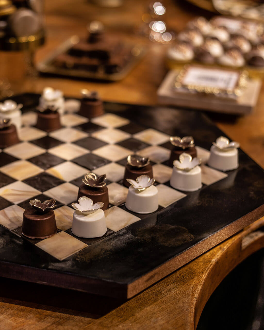 chess board on a desert station made out of cake
