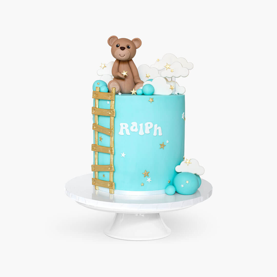 Teddy bear cake with gold ladder and clouds and stars decorations