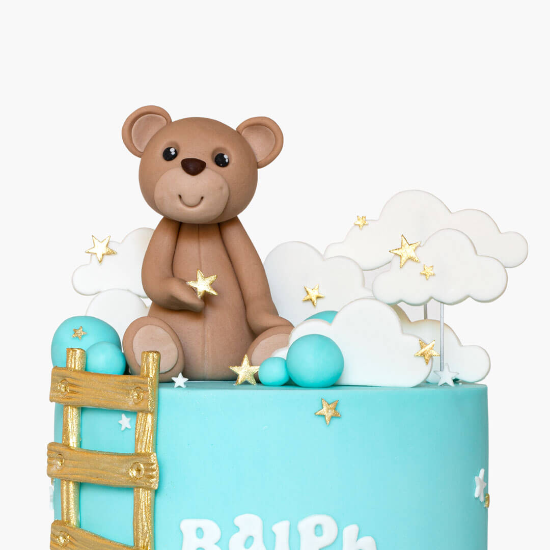 Teddy bear cake with gold ladder and clouds and stars decorations